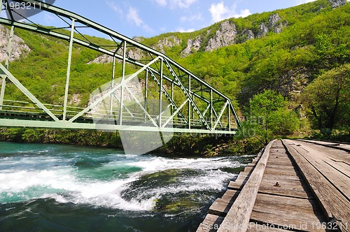 Image of bridge river wild
