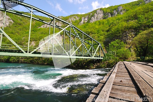 Image of bridge river wild