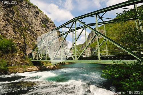 Image of bridge river wild