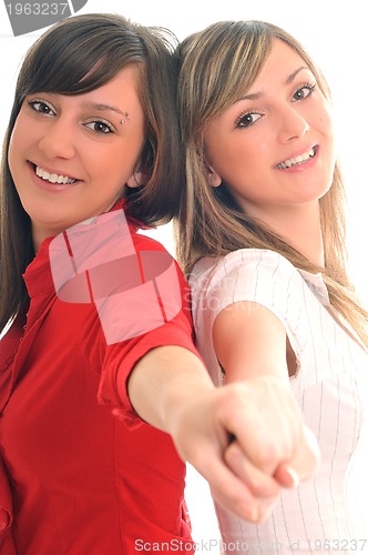 Image of two young girls isolated on white