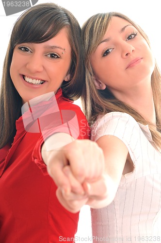 Image of two young girls isolated on white