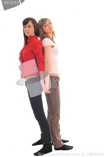 Image of two young girls isolated on white