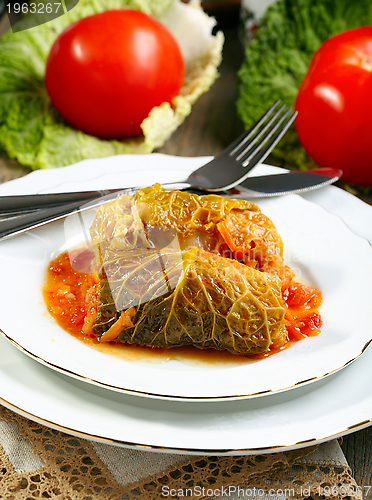 Image of Stuffed savoy cabbage with tomato sauce.