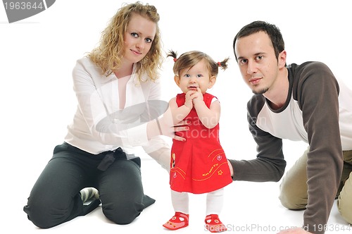 Image of happy young family together in studio
