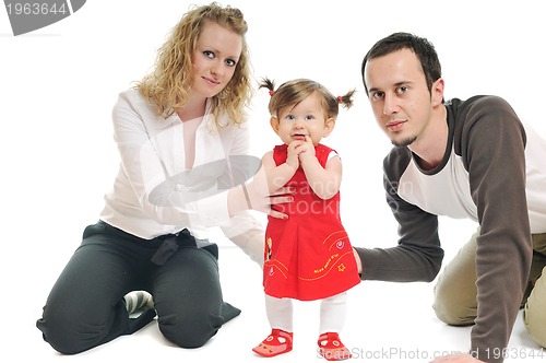 Image of happy young family together in studio