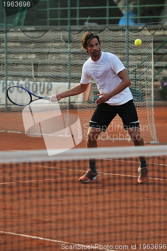 Image of tennis man