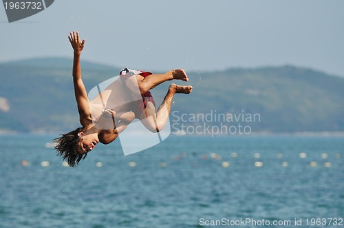 Image of boy jump sea