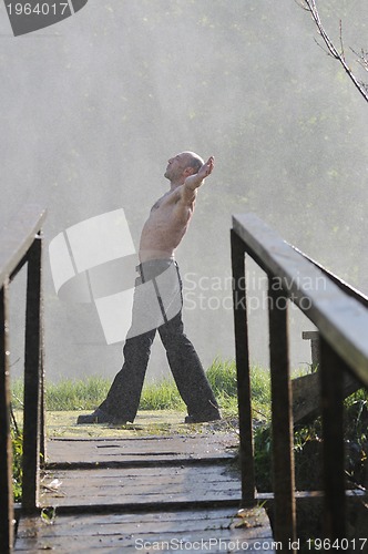 Image of man waterfall