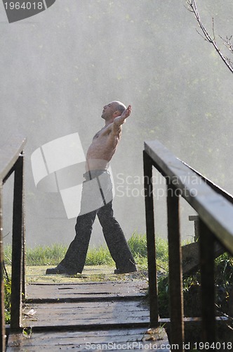 Image of man waterfall