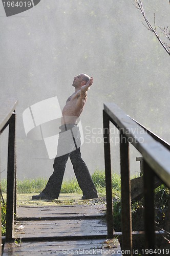 Image of man waterfall