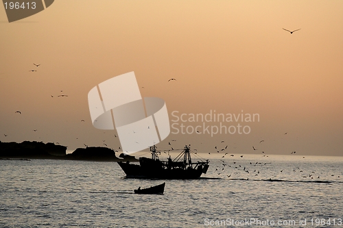 Image of Sunset on fish boat