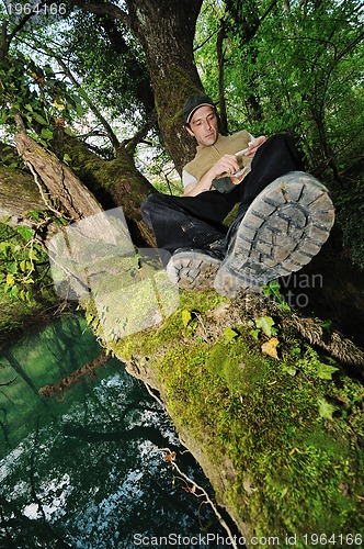 Image of man relaxing outdoor