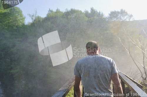 Image of man waterfall