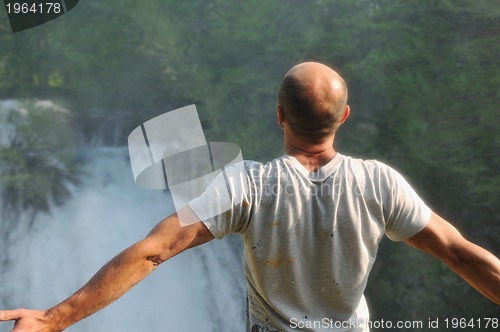 Image of man waterfall