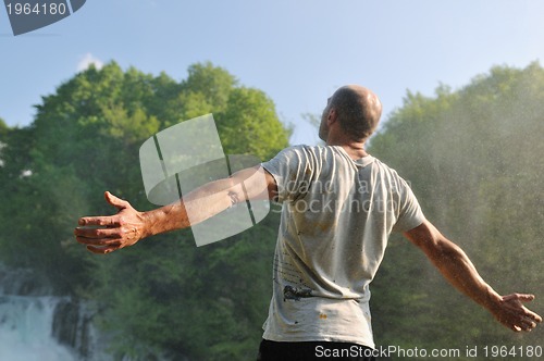 Image of man waterfall