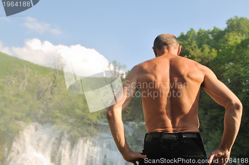 Image of man waterfall