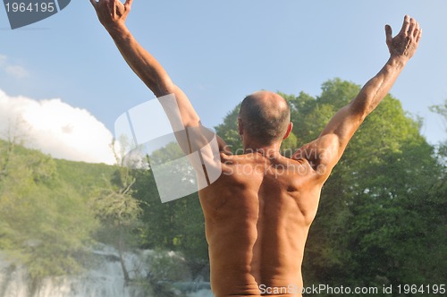 Image of man waterfall