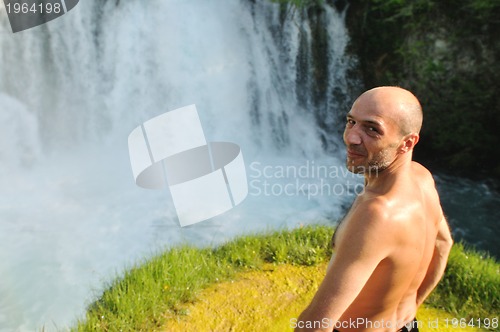 Image of man waterfall