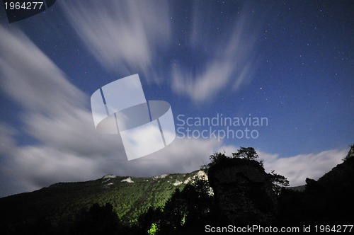 Image of wooden countryside house in night