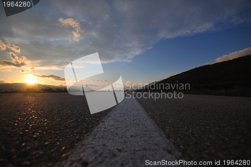 Image of countryroad adventure with beautiful sunset