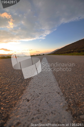 Image of countryroad adventure with beautiful sunset