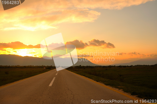 Image of countryroad adventure with beautiful sunset