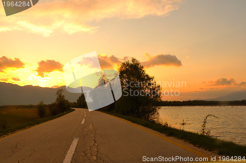 Image of countryroad adventure with beautiful sunset