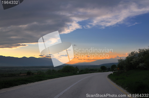 Image of countryroad adventure with beautiful sunset