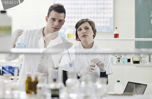 Image of students couple in lab