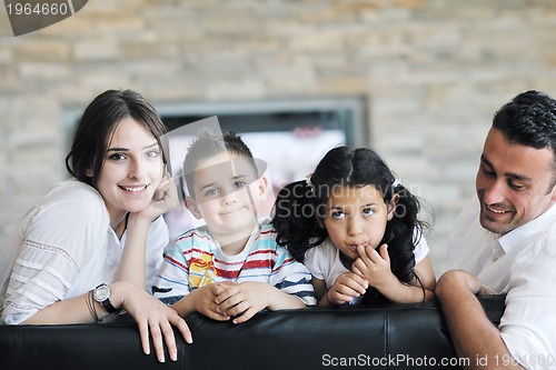 Image of young family at home