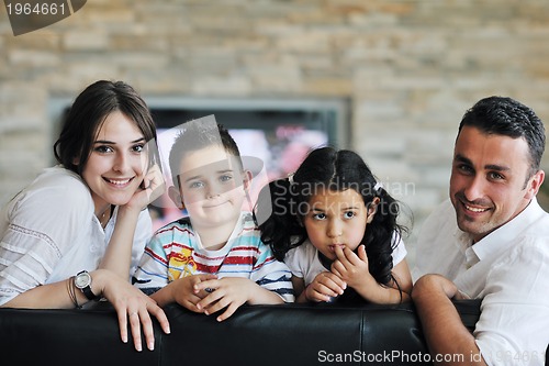 Image of young family at home