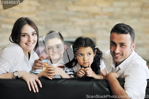 Image of young family at home