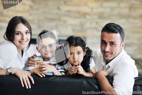 Image of young family at home