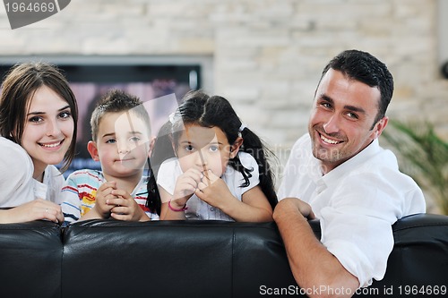 Image of young family at home