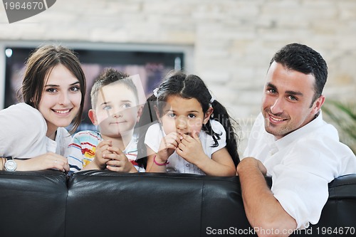 Image of young family at home