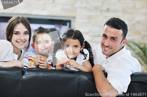 Image of young family at home