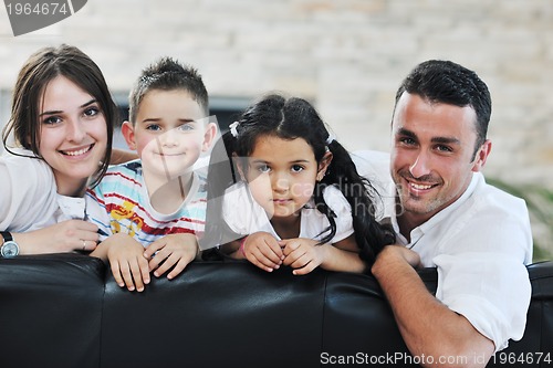 Image of young family at home