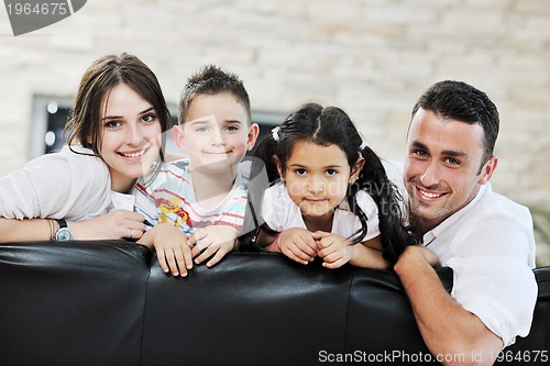 Image of young family at home