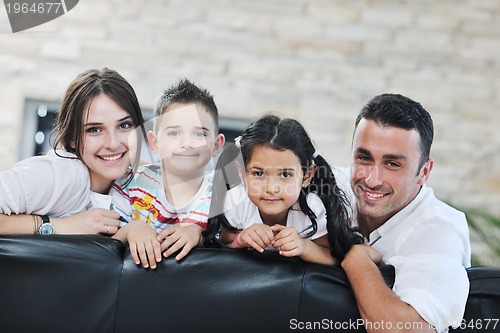 Image of young family at home