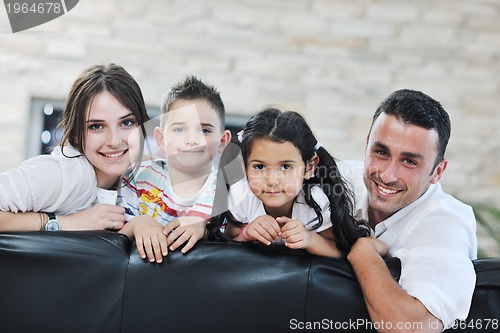 Image of young family at home