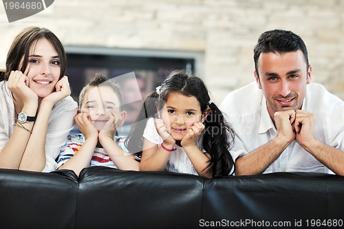 Image of young family at home