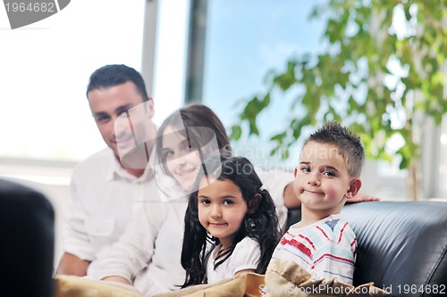 Image of young family at home