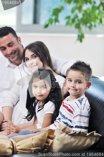 Image of young family at home