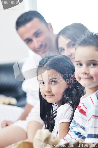 Image of young family at home