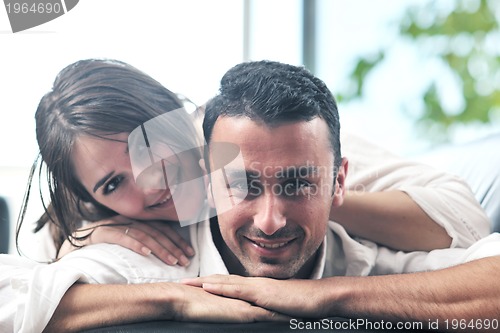 Image of young family at home