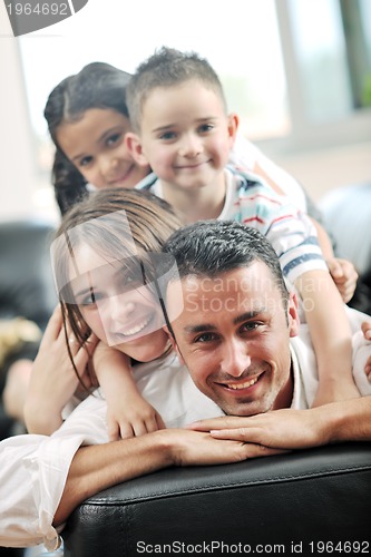 Image of young family at home