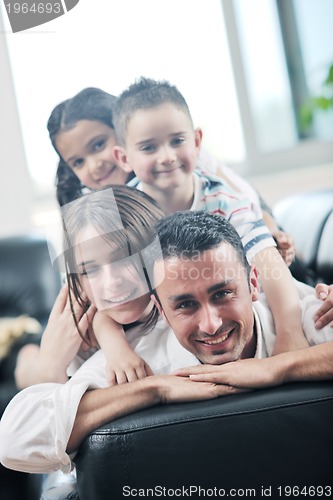 Image of young family at home