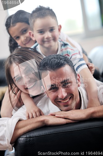 Image of young family at home