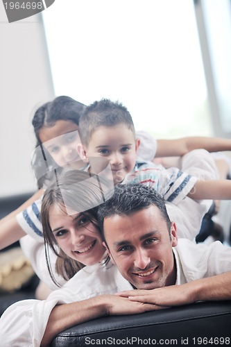 Image of young family at home