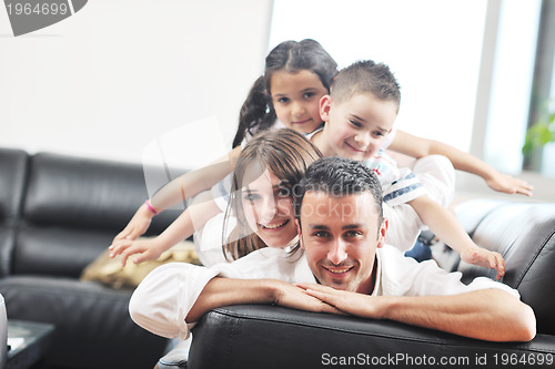 Image of young family at home